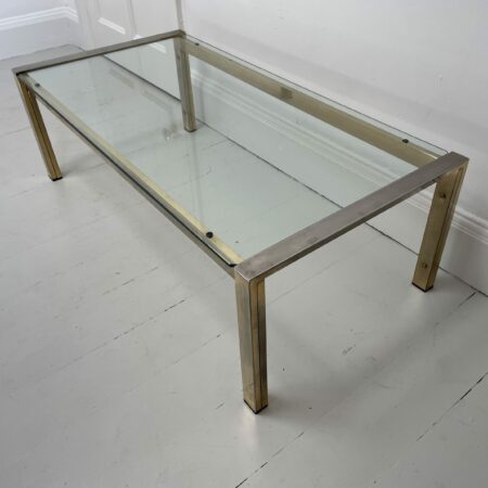 1970s Glass Coffee Table with a Brass and Chrome Frame