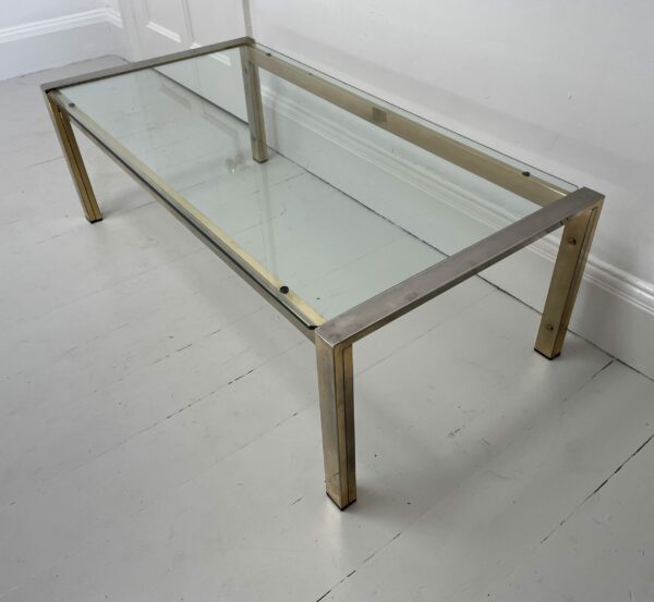 1970s Glass Coffee Table with a Brass and Chrome Frame