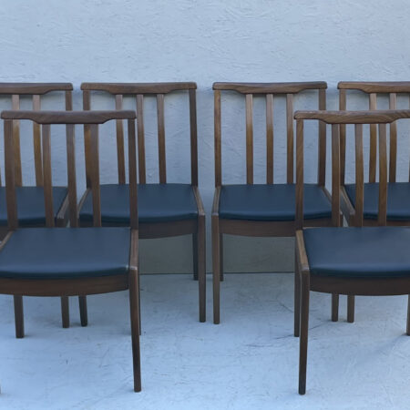 6 Mid Century Teak Dining Chairs upholstered in Black Leatherette