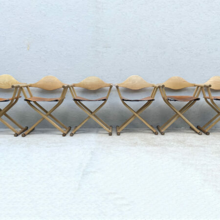 A Set Of 6, 1980's David Colwell, C2 Folding, Directors Chairs, Steam Bent Ash And Tan Leather